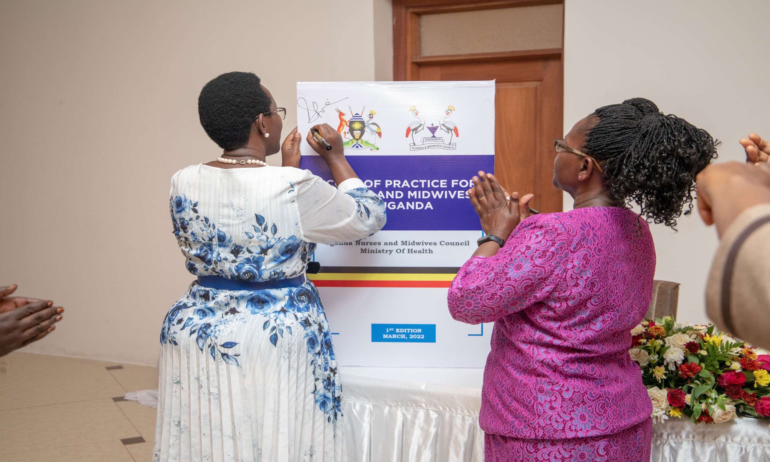 Permanent Secretary Ministry of Health Dr Dianah Atwiine launching Scope of practice for Nurses and Midwives in Uganda